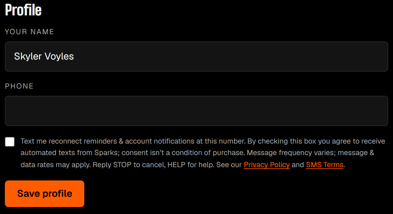 Sparks Settings screen showing the phone number field and the unchecked SMS consent checkbox with its disclosure text